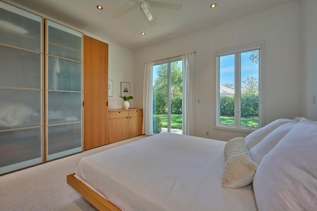 bedroom with carpet and ceiling fan