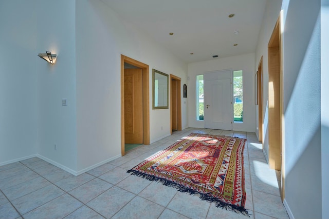 entrance foyer featuring light tile patterned flooring