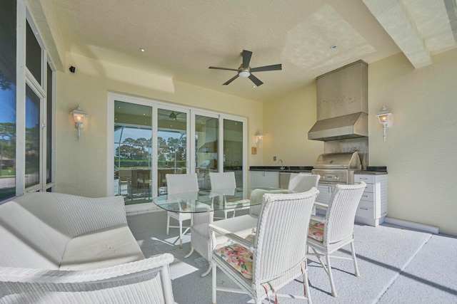 view of patio / terrace with sink, area for grilling, ceiling fan, and a grill