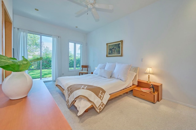 bedroom featuring access to exterior, carpet floors, and ceiling fan