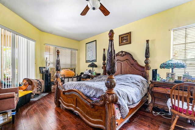 bedroom featuring dark hardwood / wood-style flooring and ceiling fan