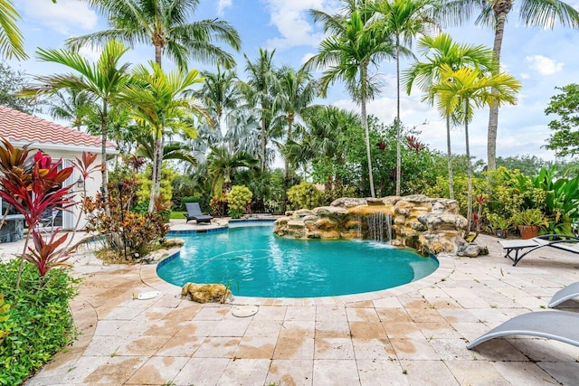 7580 Red River Rd, West Palm Beach, FL 33411 - outdoor pool featuring a patio area