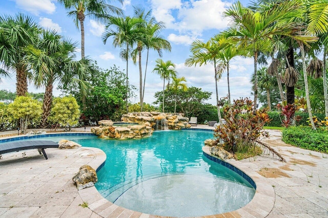 view of pool featuring a patio