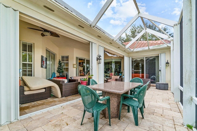 7580 Red River Rd, West Palm Beach, FL 33411 - sunroom with ceiling fan and outdoor dining area