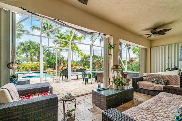 7580 Red River Rd, West Palm Beach, FL 33411 - sunroom featuring an outdoor hangout area and ceiling fan