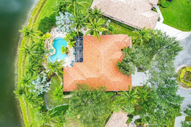 birds eye view of property featuring a water view