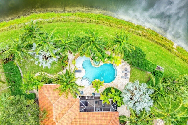 birds eye view of property with a water view