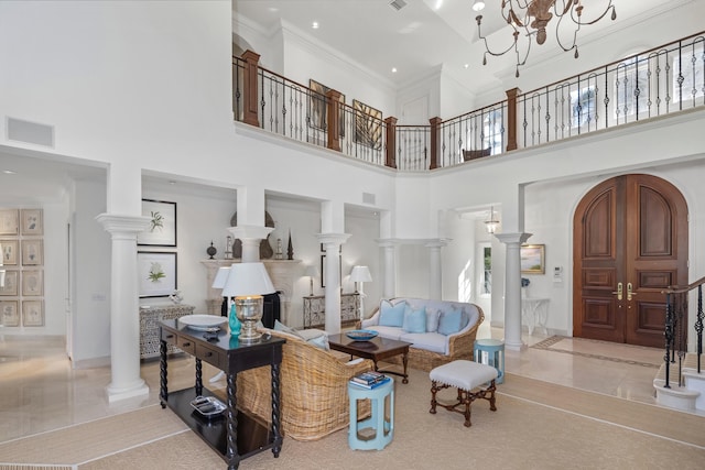 living room featuring a high ceiling and an inviting chandelier