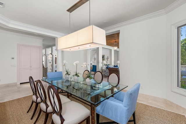 tiled dining room with ornamental molding