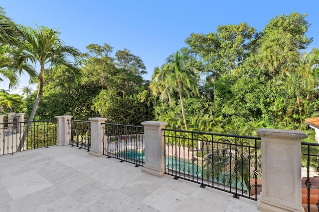 exterior space with a fenced in pool