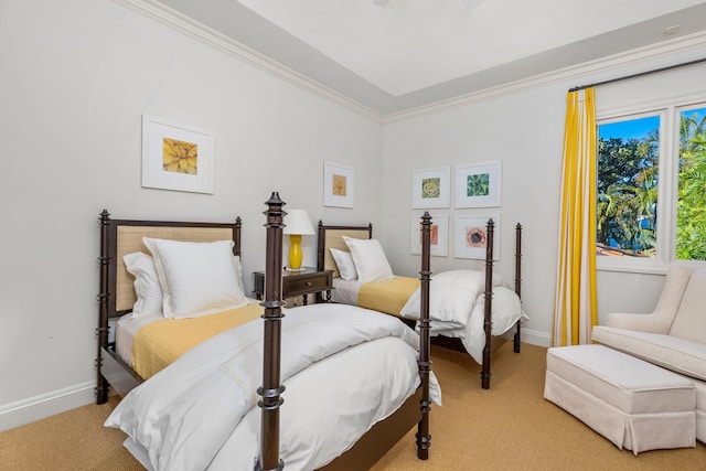 carpeted bedroom featuring crown molding