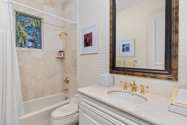 full bathroom with vanity, shower / bath combo with shower curtain, and toilet