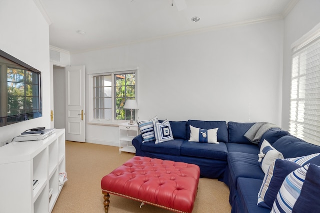 living room featuring carpet flooring, ornamental molding, and plenty of natural light