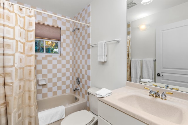 full bathroom with toilet, vanity, and shower / bath combo with shower curtain