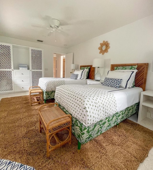 carpeted bedroom featuring ceiling fan