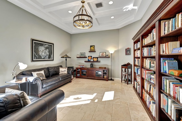 living room with beam ceiling, coffered ceiling, and a notable chandelier