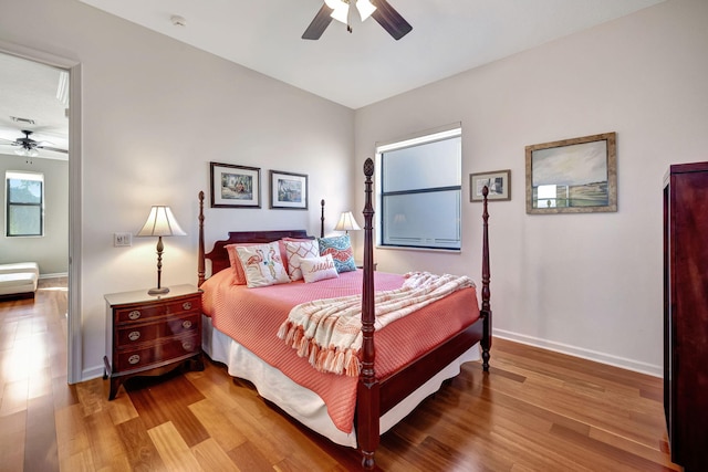 bedroom featuring ceiling fan and hardwood / wood-style floors