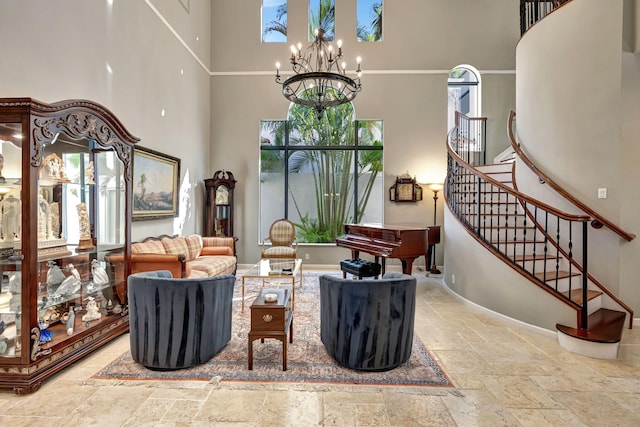 living room with a chandelier and a towering ceiling