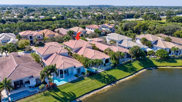 drone / aerial view with a water view