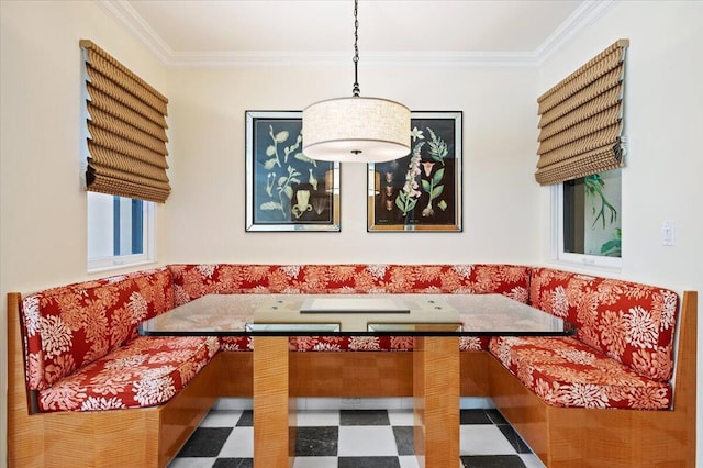 dining area with crown molding and breakfast area