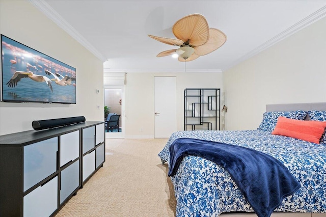 bedroom featuring light colored carpet, ceiling fan, and crown molding