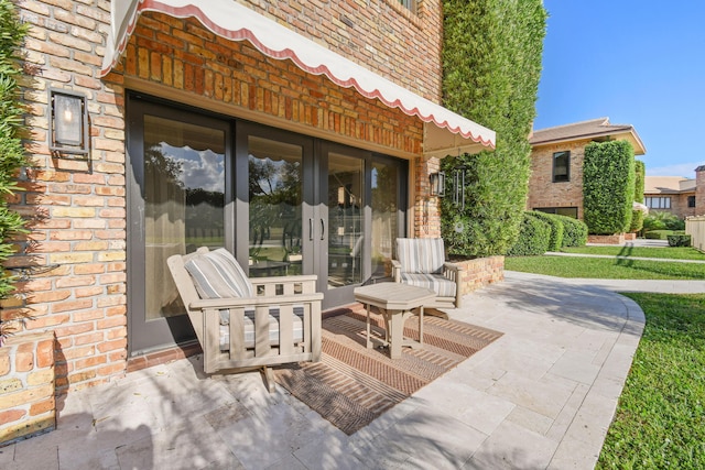 view of patio featuring french doors