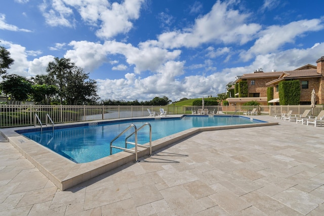 view of pool with a patio area