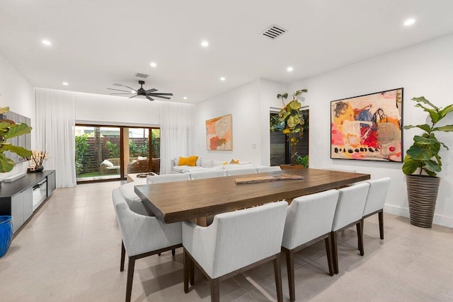 dining space with ceiling fan