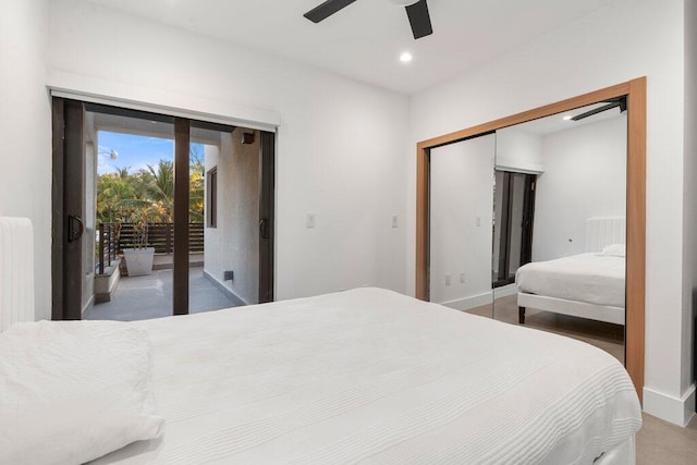 bedroom featuring hardwood / wood-style flooring, ceiling fan, access to outside, and a closet