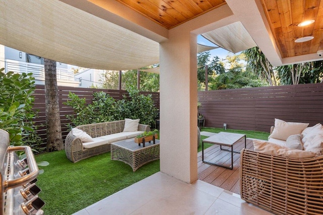 view of patio / terrace with outdoor lounge area and a wooden deck