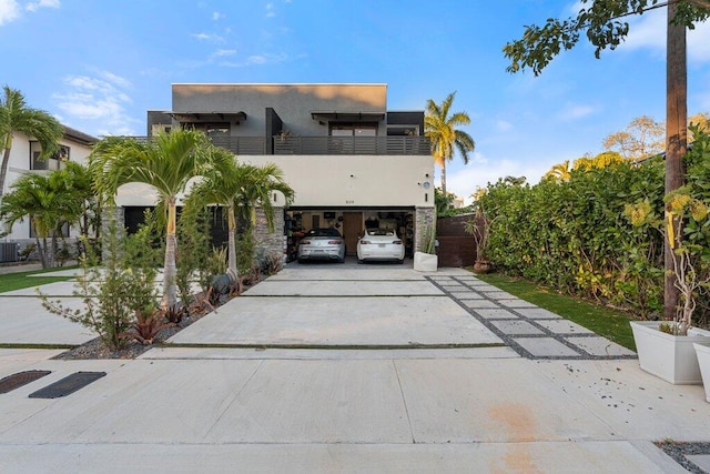 view of front of house with a balcony