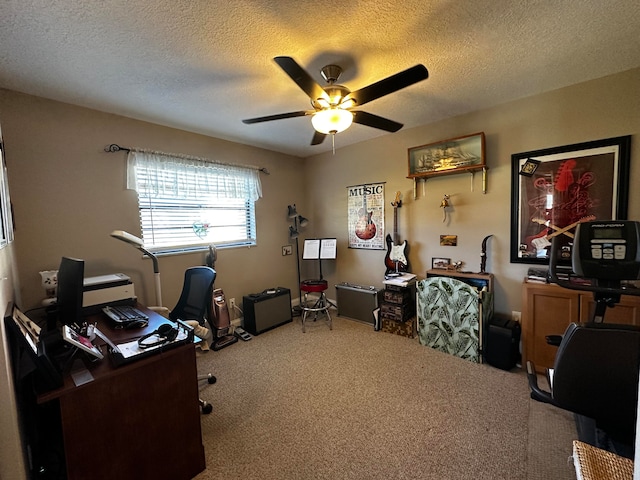 carpeted office with ceiling fan and a textured ceiling