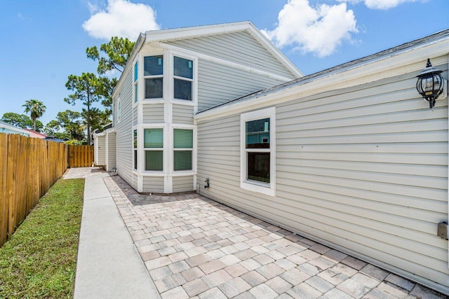 back of house with a patio