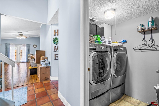 laundry room featuring a textured ceiling, hardwood / wood-style flooring, ceiling fan, and washing machine and clothes dryer