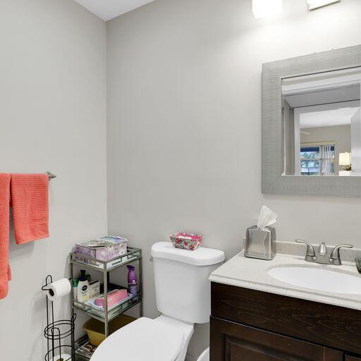 bathroom featuring vanity and toilet