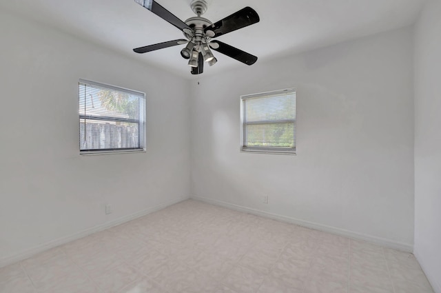 unfurnished room with ceiling fan