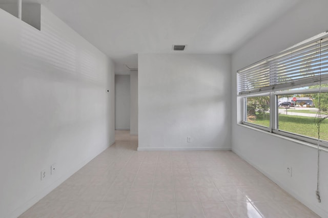 view of tiled spare room