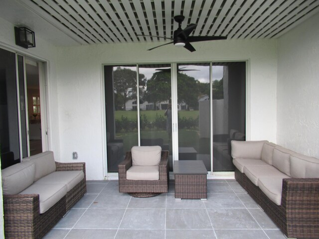 view of patio / terrace featuring a balcony and ceiling fan