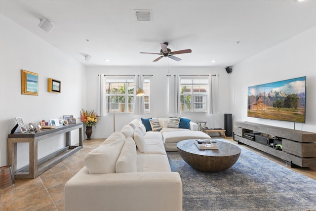 living room featuring ceiling fan