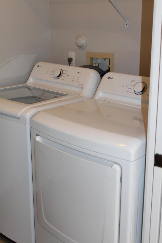 laundry area with washer and clothes dryer