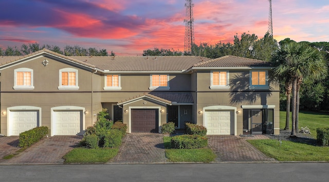 view of front of home with a garage