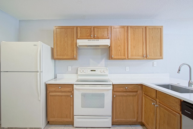 kitchen featuring sink, light tile patterned floors, and white appliances