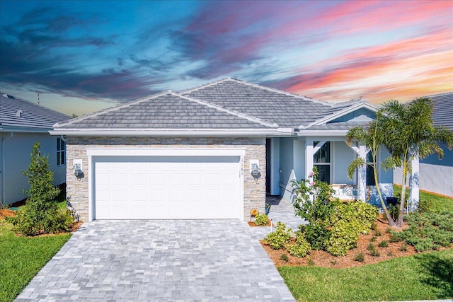 view of front of property with a garage