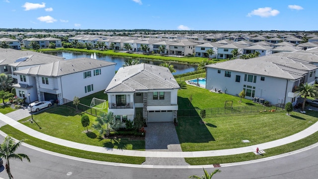 drone / aerial view with a water view