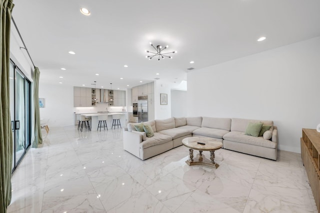 living room with a notable chandelier