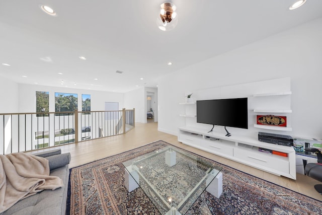 living room with light hardwood / wood-style flooring