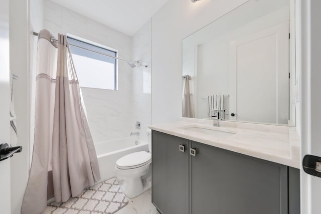 full bathroom featuring shower / bath combo, toilet, and vanity