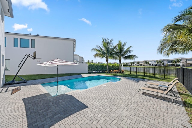 view of swimming pool featuring a patio area