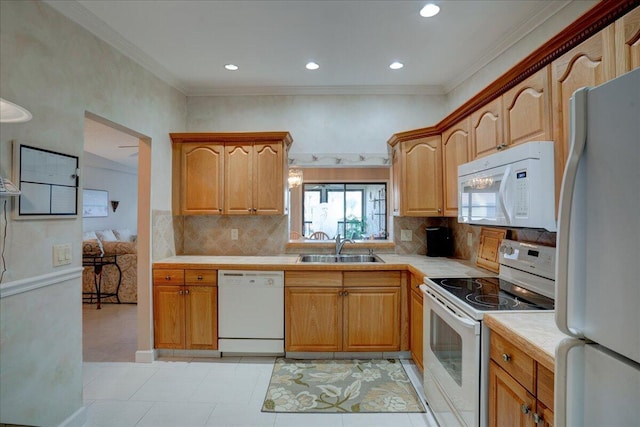 kitchen with crown molding, sink, light tile patterned floors, and white appliances