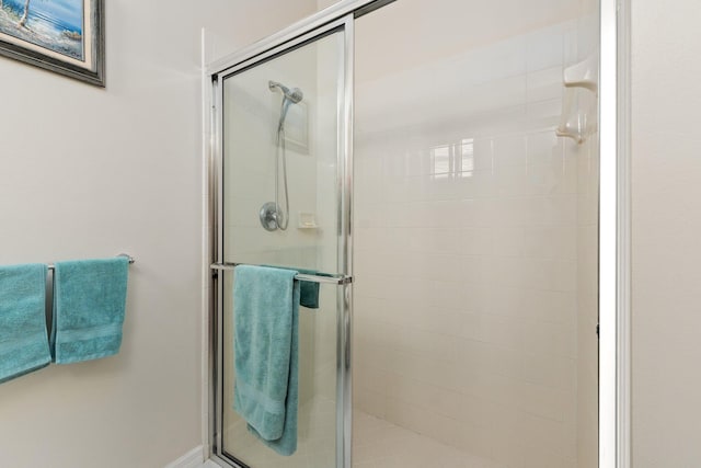 bathroom featuring an enclosed shower